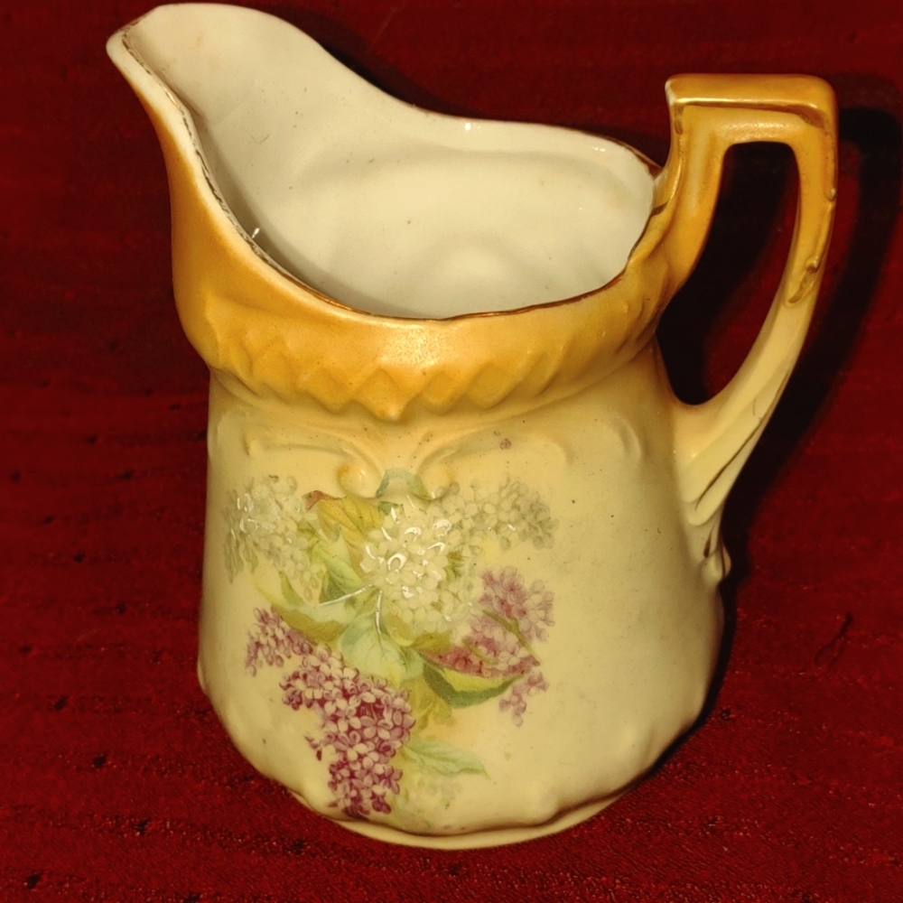 Antique handmade creamer pitcher